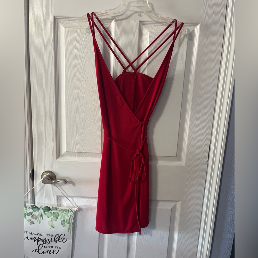 Red, wrap around style, spaghetti strap dressx Brand new/with tags.